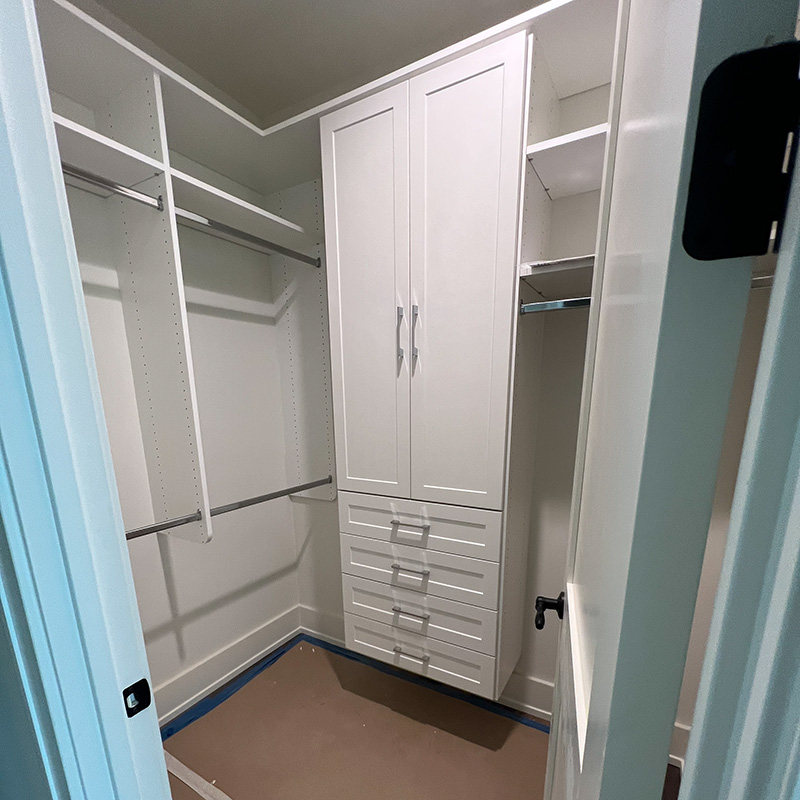 Custom walk-in closet by Ponte Vedra Closets